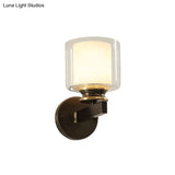 Black 1-Light Wall Sconce - Traditional Metal Cylinder With Double-Tier Glass Shade For Bedroom