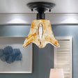 Black Flower Shaped Flush Mount Lamp With Classic Tan Textured Glass For Living Room Ceiling