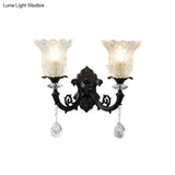 Black Flower Wall Lamp With Clear Crystal Glass Shade & Minimalist Design