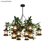 Black Industrial Lantern Chandelier With Green Vine Accents And Clear Glass Stylish Suspension Light