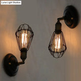 Black Industrial Wall Mount Iron Light Fixture With Single Pear Cage Bulb