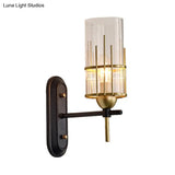 Black Metal Wall Sconce With Clear Glass Shade For Bedside Lighting