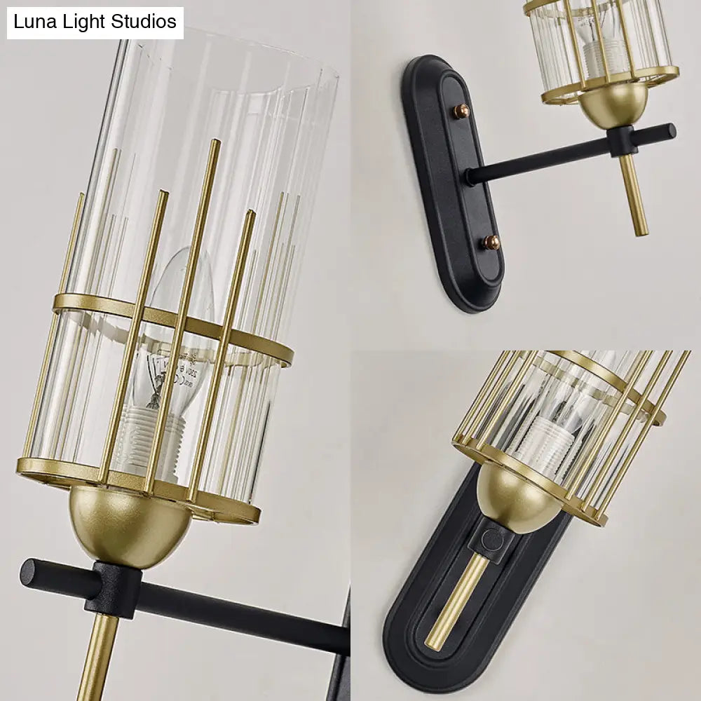 Black Metal Wall Sconce With Clear Glass Shade For Bedside Lighting
