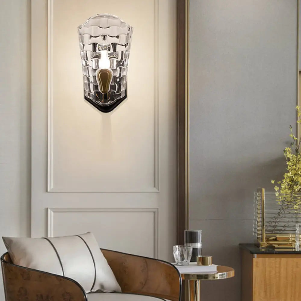 Black Modernist Wall Sconce With Curved Metal Arm And Clear Crystal Panel
