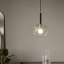 Black Textured Glass Dining Room Pendant With Modern Spherical Hanging Design