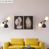 Black Tulip Wall Sconce With Ivory Glass And Crystal Accent