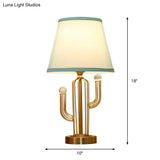 Blue Fabric Cone Night Table Lamp With Clear Crystal Orbit Decor And Metal Base