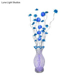 Blue Led Curvy Floor Lamp With Aluminum Urn And Floral Art Decor