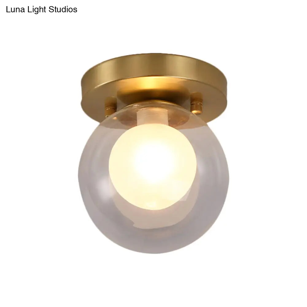 Brass Dual Orb Ceiling Flush Mount Fixture With Clear And Opal Glass