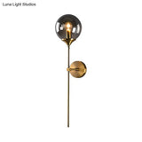 Brass Globe Shade Wall Sconce - Modern Single Bulb Clear/Grey/Amber Glass Light For Bedroom