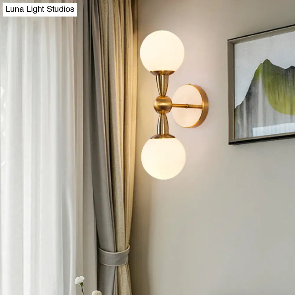 Brass Orb Wall Mount Light With Opal Glass Lampshade - Mid Century Lighting Idea