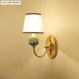Brass Wall Hanging Light With Classic Swooping Arm And Fabric Shade