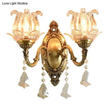 Brass Wall Mount Sconce With Clear Glass 1/2-Light For A Classic Floral Look