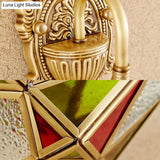 Brass Wall Sconce With Textured Glass And Curved Arm