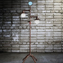 Bronze Pipe Floor Light: Industrial Iron Quadpod Lamp With Saucer Lampshade Weathered Copper