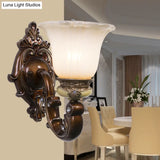 Brown Antiqued Invert Bell Single Light Wall Sconce With Cream Fluted Glass