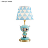 Cartoon Cow Boy Night Lamp With Triangle Print Shade In Pink/Blue - Resin Table Lighting