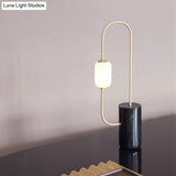 Caterina - Black Circuit Nightstand Light Designer Marble 1-Light Black and Brass Table Lamp with Oval Milk Glass Shade