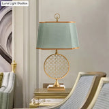 Chinese Style Led Desk Lamp With Gold Drum Shape & Green Fabric Shade