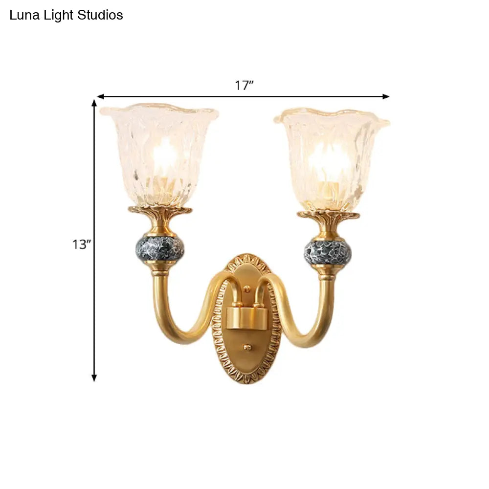 Classic Brass Floral Wall Sconce With Clear Ribbed Glass And Swooping Arm - 1/2-Head Mount Lamp