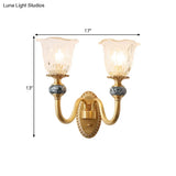 Classic Brass Floral Wall Sconce With Clear Ribbed Glass And Swooping Arm - 1/2-Head Mount Lamp