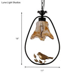 Classic Round/Oval Tan Textured Glass Pendant Light With Bird Accent In Black