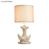 Classic White/Tan Cylinder Desk Lamp With Ceramic Sailboat Base - Plug-In Table Light