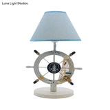 Coastal White Nightstand Lamp With Fabric Cone Shade And Rudder Decor - 1 Light