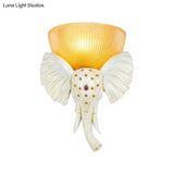 Colonial Bowl Wall Mount Lamp - Amber Glass With Elephant Nose Design Left/Right