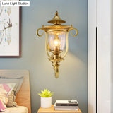 Colonial Curved Arm Brass Gold Wall Sconce With Clear Glass Shade - 1/2 Head Mounted Lamp