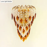 Contemporary 2-Light Brass Finish Wall Lamp With Tan/Blue Crystal Shade