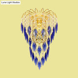 Contemporary 2-Light Brass Finish Wall Lamp With Tan/Blue Crystal Shade