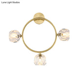 Contemporary 3-Head Brass Wall Sconce With Modo Crystal Shade - Ring/Square Light Fixture