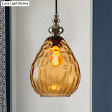 Contemporary Amber/Clear Dimple Glass Water Drop Pendant Lamp - 6/8 Wide 1 Head Bedside Hanging