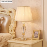 Contemporary Beige Crystal Reading Lamp: Jar Shape Faceted Design With Task Lighting
