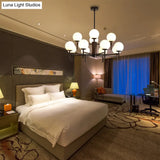 Contemporary Black/Gold Globe Chandelier with Radial Design - 6/8/9 Lights Milk Glass Hanging Lamp