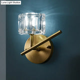 Contemporary Brass Wall Sconce With Clear Crystal Shade For Bedroom