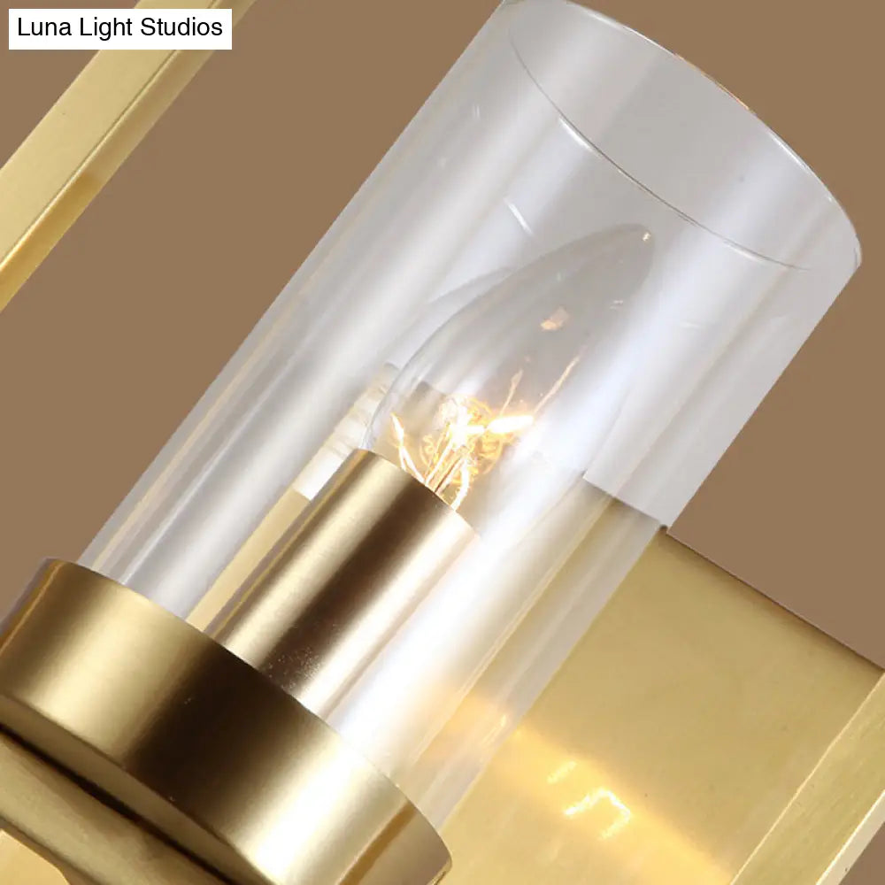 Contemporary Brass Wall Sconce With Clear Glass Shade - Cylindrical Bedroom Light Fixture