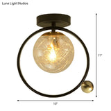Contemporary Clear Glass Ceiling Mounted Fixture - Spherical Semi Flush Light With Single Bulb Black