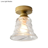 Contemporary Cyclone Glass Flush Mount Lamp With Clear Bell Shade