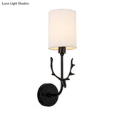 Contemporary Cylinder Wall Sconce With Fabric Shade - Coastal-Inspired Living Room Lighting In