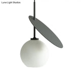Contemporary Glass Globe Pendant Light With Metallic Circle - Ideal For Restaurants
