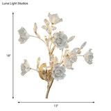 Contemporary Gold Crystal Wall Lamp With Teardrop Faceted Design And Ceramic Flower Accents - 3 Bulb