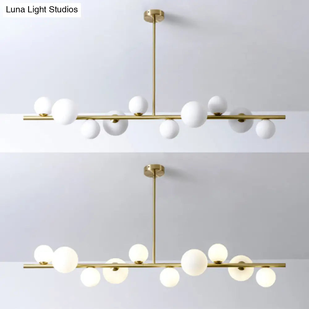 Contemporary Gold Metal Island Pendant Light With Glass Sphere For Dining Table