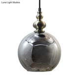 Contemporary Hammered Glass Pendant Light for Boutique Kitchen - 1 Bulb Globe Suspension Light