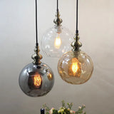 Contemporary Hammered Glass Pendant Light for Boutique Kitchen - 1 Bulb Globe Suspension Light Clear