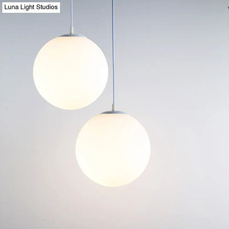 Contemporary Milky Glass Orb Pendant Light With 1-Bulb Suspension - Modern Style Fixture