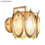 Contemporary Oval Wall Light With Clear Crystal Deco - Metallic 1-Light Fixture For Living Room
