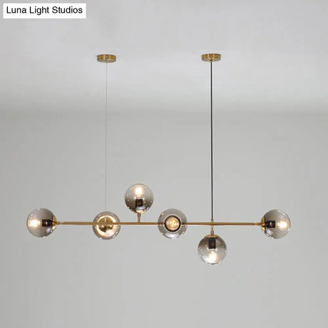 Contemporary Smoke Gray Glass Globe Hanging Light Fixture - 6 Head Gold Island