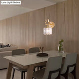 Contemporary Wall Sconce With K9 Crystal Cylinder Bird Accent And Black/Gold Finish